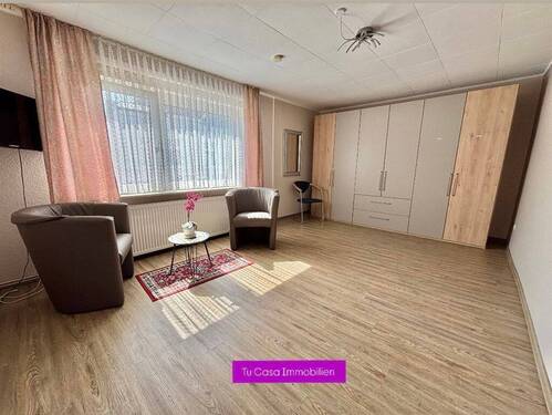 Wohnzimmer OG - 6 Zimmer Mehrfamilienhaus, Wohnhaus zum Kaufen in Norderney