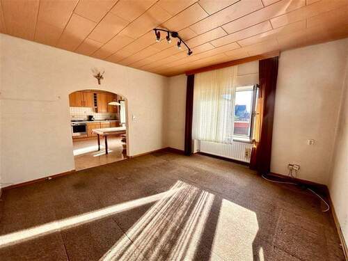 Wohnzimmer - Mehrfamilienhaus, Wohnhaus mit 135,00 m&sup2; in Illingen zum Kaufen