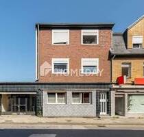 Solides Mehrfamilienhaus mit freier Gewerbefläche, Terrasse, Balkon und Stellplätzen in Alsdorf