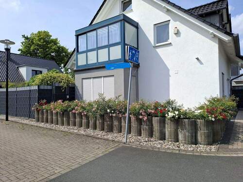 seiten Ansicht - Viel Platz für Familie & Mehrgenerationen - Haus mit Einliegerwohnung in Werl (59457)