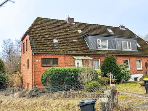 Außenansicht - Kiel-Kroog - Doppelhaushälfte mit viel Potential in Sackgassenlage mit großem Grundstück