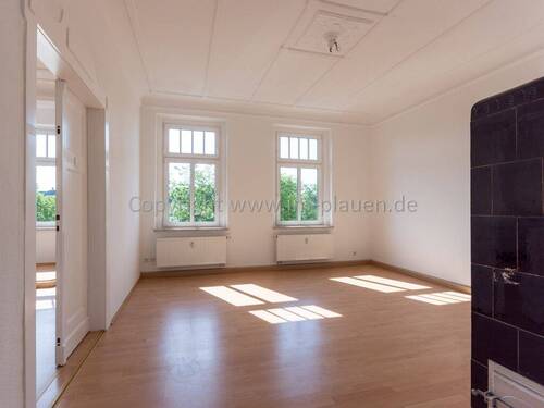 Wohnzimmer mit Kachelofen - 