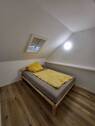 Schlafzimmer 2 - Mehrfamilienhaus, Wohnhaus mit 115,00 m&sup2; in Coburg zur Miete