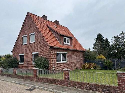 Ansicht - 6 Zimmer Mehrfamilienhaus, Wohnhaus zum Kaufen in Schneverdingen