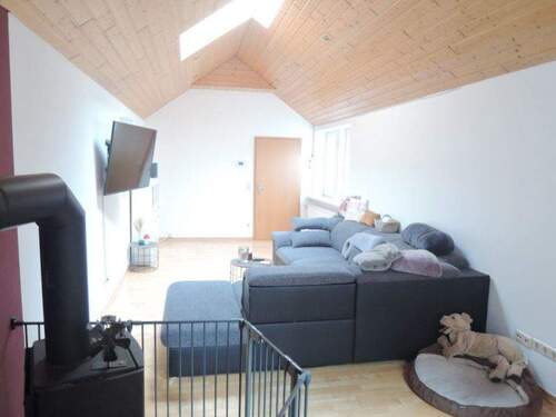 Wohnzimmer mit Kaminofen - 