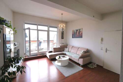 Wohnzimmer Ansicht 3 - Etagenwohnung mit 63,00 m² in Wiesbaden zur Miete