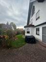 Gartenseite mit Terrasse EG
- 