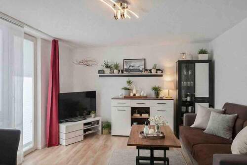 Wohnzimmer bearbeitet - Solide vermietetet 2 Zimmer-Wohnung mit TG-Stellplatz