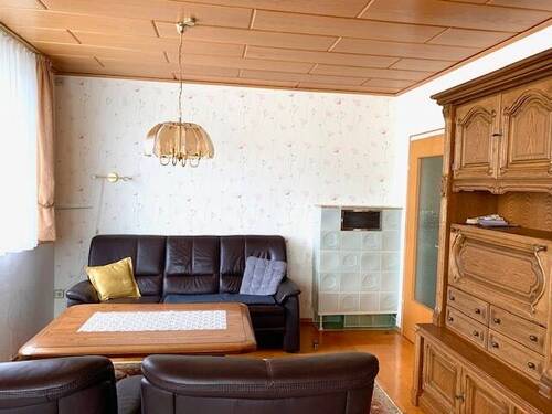 Wohnzimmer mit Kachelofen - 