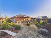 Hausansicht (Nordwest) - Barrierefreies Wohnglück in Wienhausen: Neuwertiger Bungalow mit Garten-Idylle!