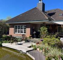 Charmantes Einfamilienhaus mit Keller, Einliegerwohnung, Teich und Doppelgarage - Ratekau