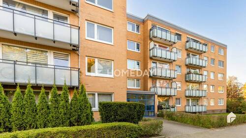 Außenansicht 1 - Charmante 3-Zimmer-Etagenwohnung mit Südwest-Balkon in begehrter Lage von Halstenbek