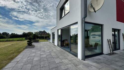 Außenansicht + Wintergarten (Südseite) - 4 Zimmer Einfamilienhaus zum Kaufen in Kröpelin