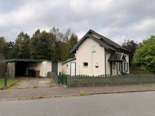 Ansicht mit Carport - 3 Zimmer Einfamilienhaus in Mühlenbarbek