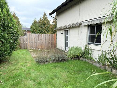 Gartenseite - Einfamilienhaus mit 90,00 m² in Mühlenbarbek zum Kaufen