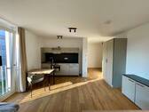 Wohnbereich - Ab sofort! Helle, möblierte 1-Zimmer-Wohnung mit Balkon!