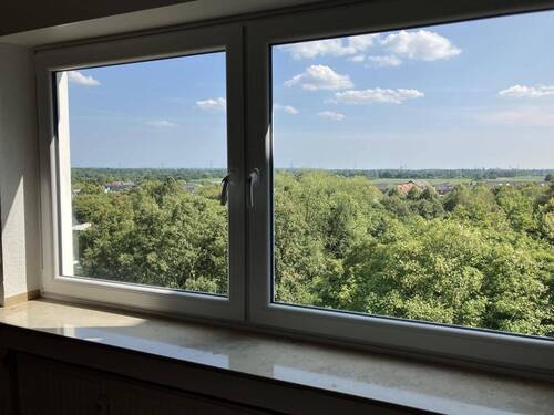 Ausblick Wohnzimmer - Eigentumswohnung mit grünem Ausblick und Tiefgaragenstellplatz