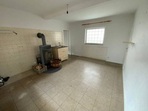 Küche mit Kaminofen - 