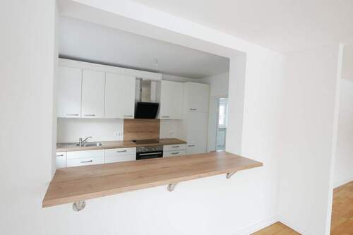 Küche mit großer Öffnung zum Esszi. - 