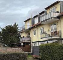 Helle 3-Zimmer-Dachgeschosswohnung mit Balkon und Weitblick – sofort frei in ruhiger Lage von Kitzingen