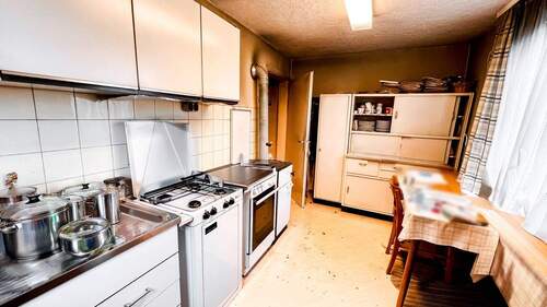Küche_KI-freigeräumt - Einfamilienhaus mit 118,00 m&sup2; in Weißbach zum Kaufen