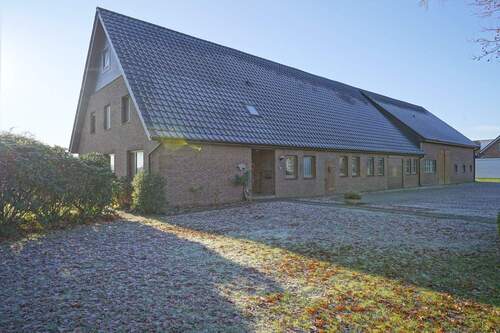 Außenaufnahme - Mehrfamilienhaus, Wohnhaus mit 120,00 m&sup2; in Geestland zum Kaufen