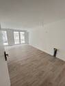 Eingang und Küche (wird eingebaut) - Neubau, Neuanfang, neues Glück: EG-Wohnung mit STP