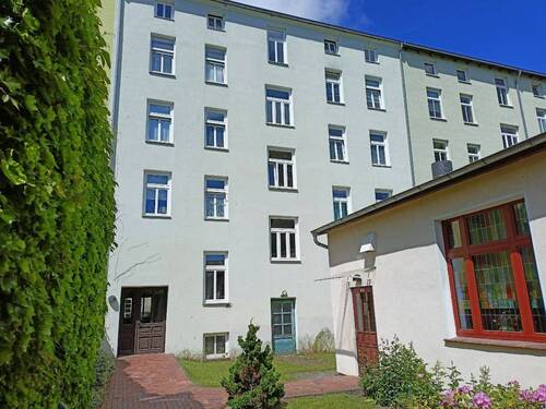 Haus-Rückansicht - 2 Zimmer Etagenwohnung zum Kaufen in Rostock