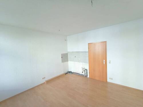 Wohnzimmer mit offenen Küchenbereich - Etagenwohnung mit 29,50 m&sup2; in Rostock zum Kaufen