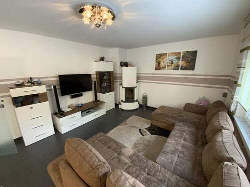 Wohnzimmer mit Schwedenofen - 