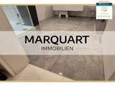 MARQUART IMMOBILIEN - Barrierefrei: Neuwertige Wohnung mit EBK, Terrasse und TG-Stellplatz in zentraler Lage