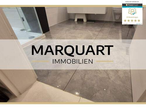 MARQUART IMMOBILIEN - Barrierefrei: Neuwertige Wohnung mit EBK, Terrasse und TG-Stellplatz in zentraler Lage