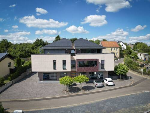 Front - Mehrfamilienhaus, Wohnhaus in Wadern / Lockweiler