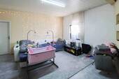 Wohnzimmer - 9 Zimmer Einfamilienhaus zum Kaufen in Monsheim