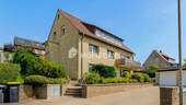 Außenansicht 1 - Mehrfamilienhaus mit drei Wohneinheiten und großzügiger Terrasse