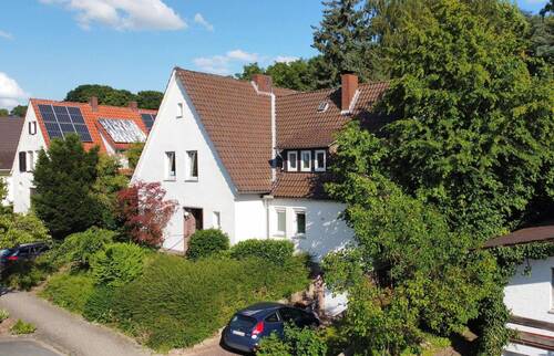 Straßenansicht - 6 Zimmer Mehrfamilienhaus, Wohnhaus zum Kaufen in Lübbecke