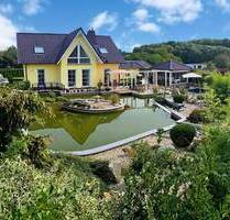 Traumhaus in Löbnitz: Exklusives Architektenhaus mit Gartenparadies, Pool, Pavillon und Nebengebäude