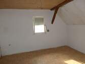 Zimmer im Dachgeschoss - 