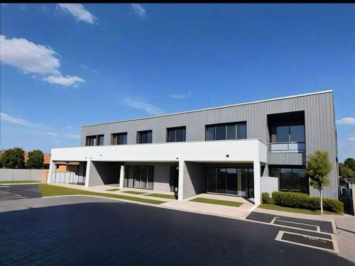 Moderne Büroimmobilie mit flexiblen Erdgeschoss-Durchgängen und repräsentativer Architektur - 