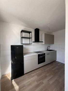 Küche mit Elektrogeräten - Etagenwohnung mit 68,80 m&sup2; in Aachen zur Miete