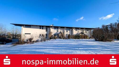 Rückansicht auf das Haus - Ihre Traum-Eigentumswohnung in unmittelbarer Ostseelage!