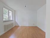 Ansicht I: Wohn- und Esszimmer mit offenem Küchenbereich - Schönes 2-Zimmer-Apartment mit modernem Wannenbad