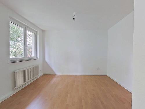 Ansicht I: Wohn- und Esszimmer mit offenem Küchenbereich - Schönes 2-Zimmer-Apartment mit modernem Wannenbad