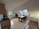 Dachgeschosswohnung - Küchen- und Essbereich - 
