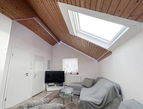 Wohnzimmer - Vermietete 2-Zimmer Wohnung - 160.000,00 EUR Kaufpreis, ca.  43,90 m² Wohnfläche