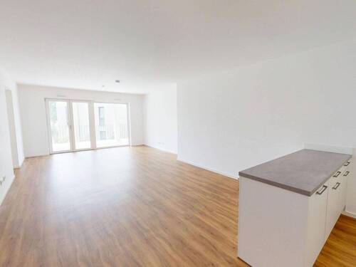 Ansicht I: Wohn- und Esszimmer mit offenem Küchenbereich - Modernität und Design: Lichtdurchflutete 3-Zimmer-Wohnung mit großem BALKON, EBK und 2 Bädern