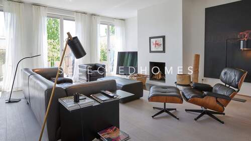 Wohnzimmer mit offenen Kamin - 3 Zimmer Etagenwohnung zum Kaufen in Hamburg