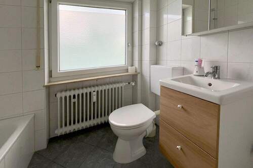 Badezimmer - Etagenwohnung mit 61,10 m² in Bad Wiessee zum Kaufen