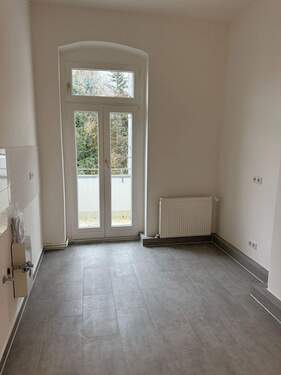 Küche mit Balkonzugang - 