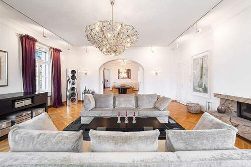 Weitläufiger Wohnbereich mit Kamin. - 6 Zimmer Etagenwohnung zum Kaufen in München